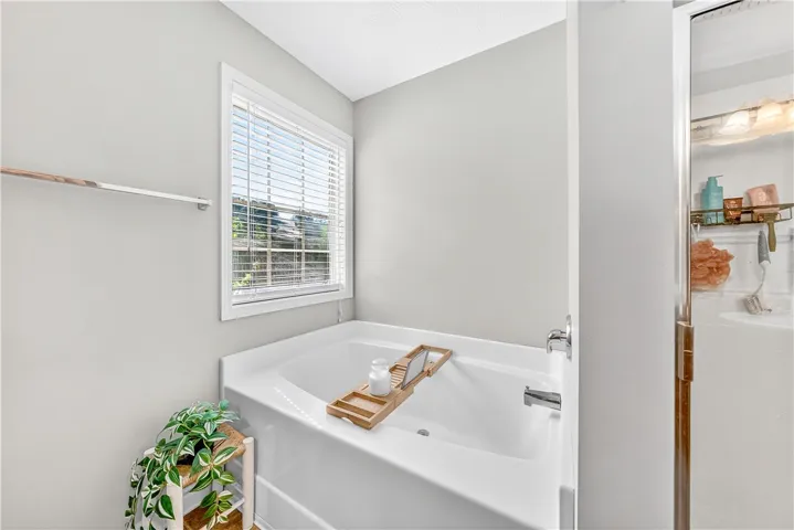 Relax in this tranquil bathing space, offering a serene escape.
