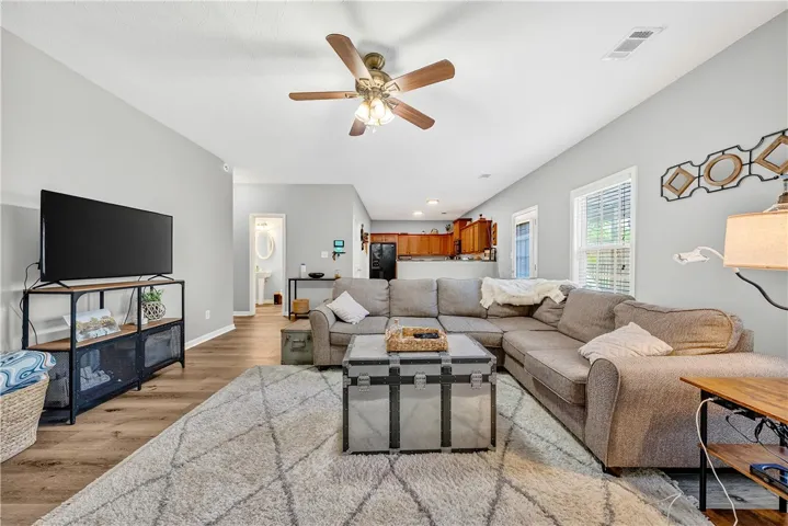 This inviting living room features an open layout, ideal for everyday living and entertaining.
