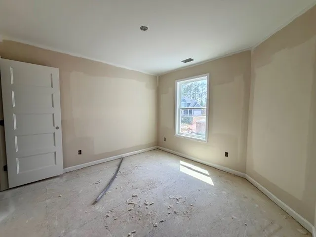 This versatile space awaits your personal touch to create a perfect bedroom.