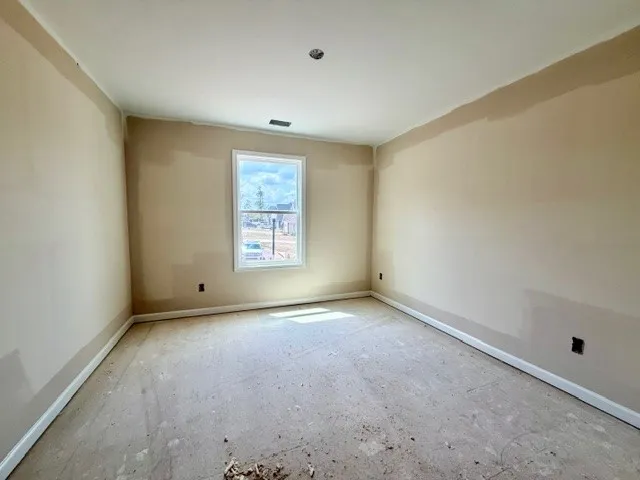 This spacious room awaits your personal touch, offering endless possibilities for customization.