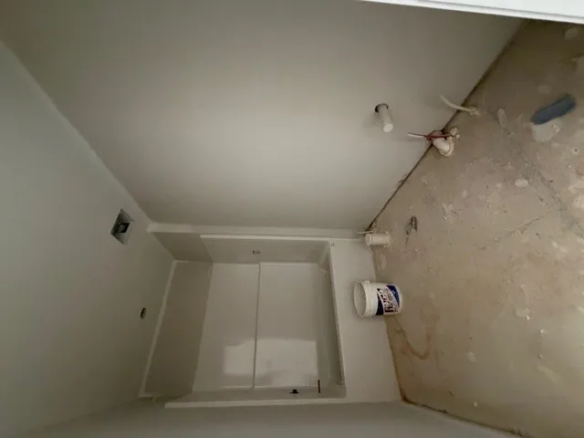 This bathroom under renovation offers a shower and opportunity to customize.