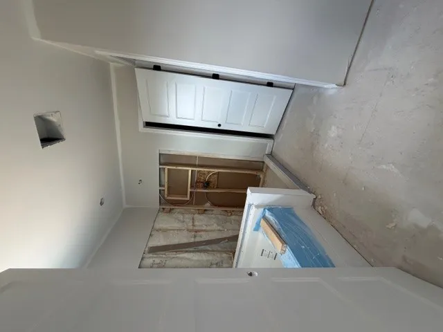 This interior captures a versatile space under construction, offering a blank canvas for customization.