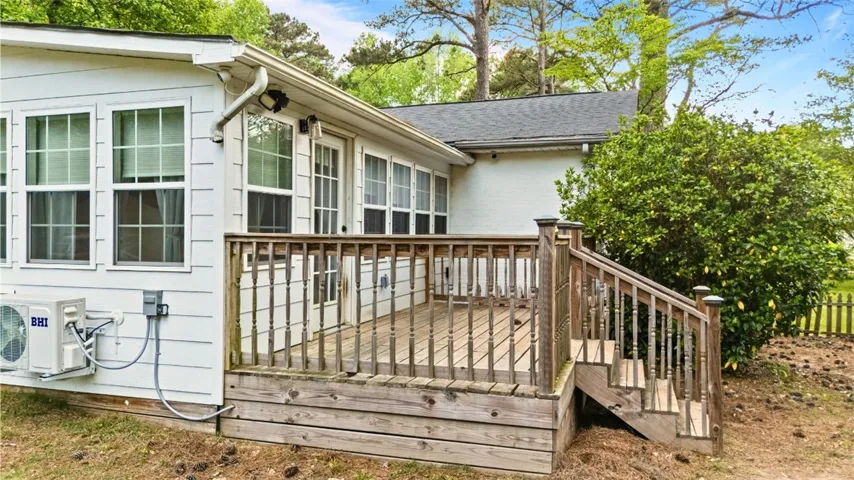 This charming property features a private deck perfect for outdoor relaxation and entertaining.