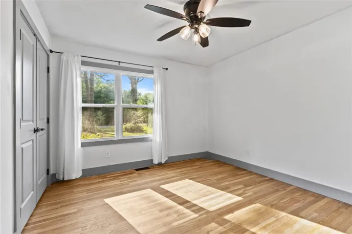 This spacious room features ample natural light, ideal for comfortable living.