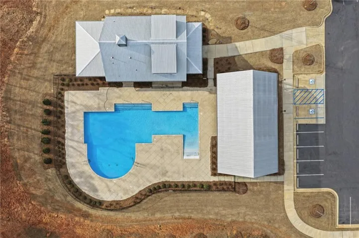 This secion of amenities includes a pool, fitness space, and community gathering area.