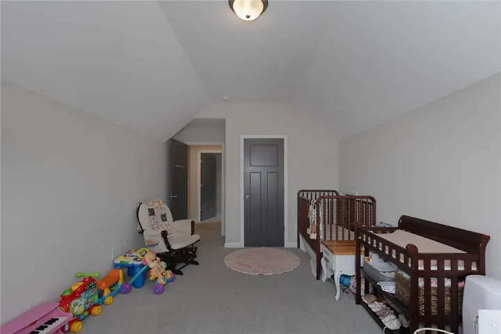 This versatile bedroom offers an adaptable space for comfort and daily living.