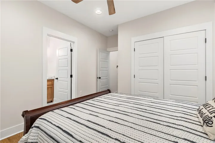 This inviting bedroom offers comfort and a well-appointed space for relaxation.