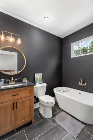 This modern bathroom features clean lines and a soothing ambiance, perfect for daily rejuvenation.