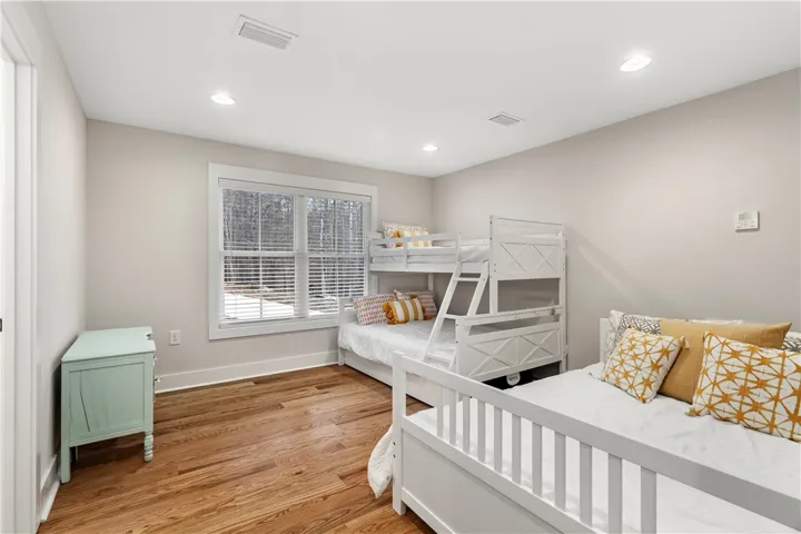 Large upstairs bedroom can function as bunk room or main suite