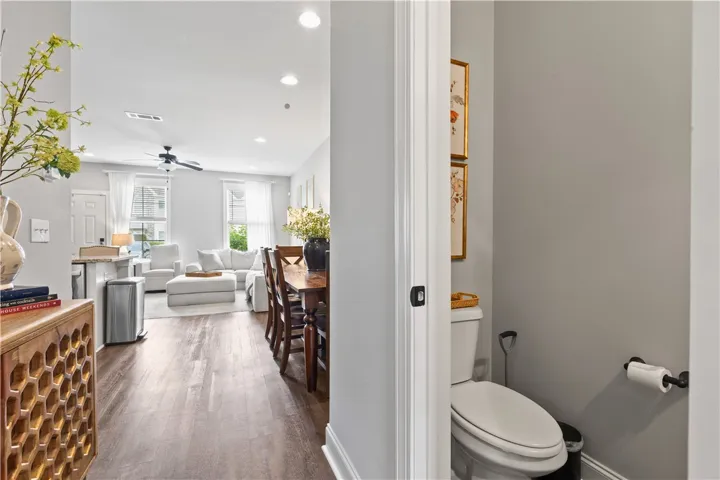 This inviting home offers an open floorplan with durable flooring, perfect for modern living.