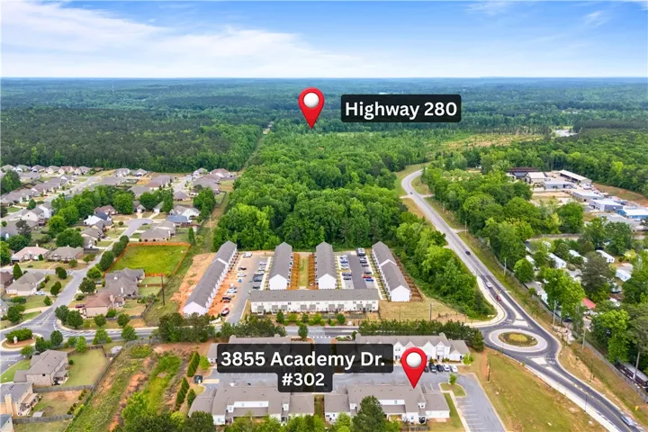 This elevated view showcases a dynamic blend of residential structures and natural surroundings.