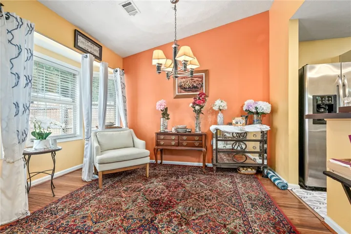 This inviting area features warm tones and ample natural light, creating a cheerful atmosphere.