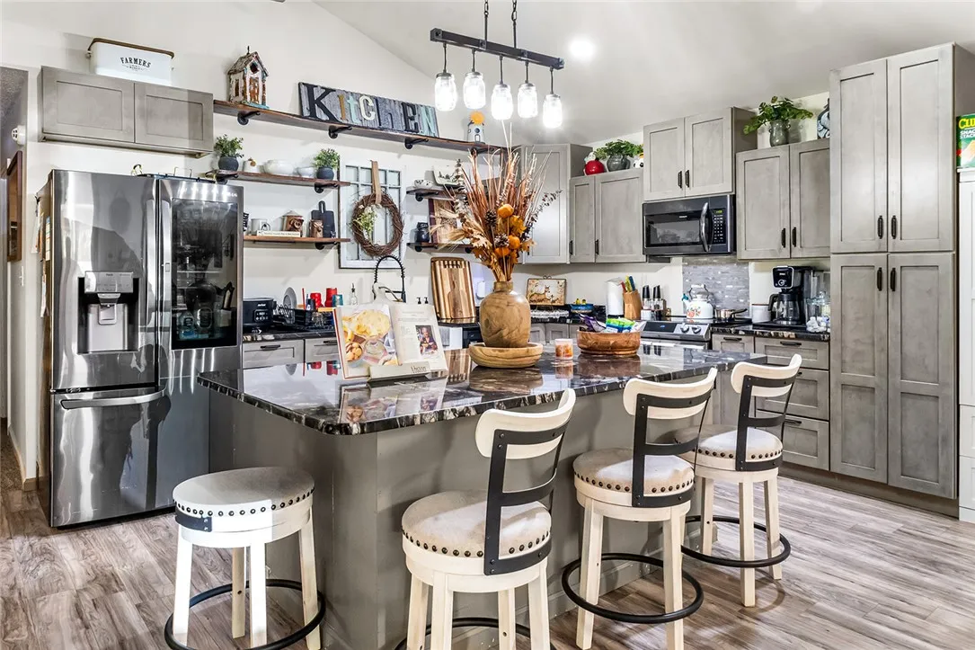 This kitchen showcases a functional layout and ample counter space for culinary endeavors.
