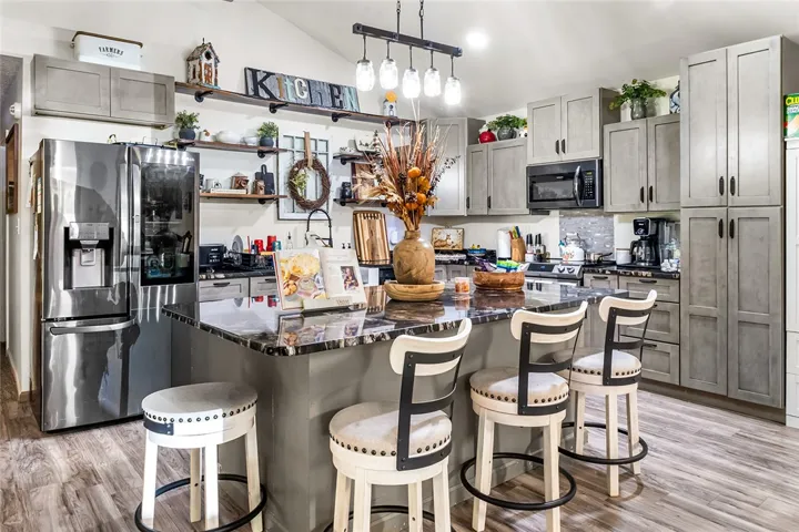 This kitchen showcases a functional layout and ample counter space for culinary endeavors.