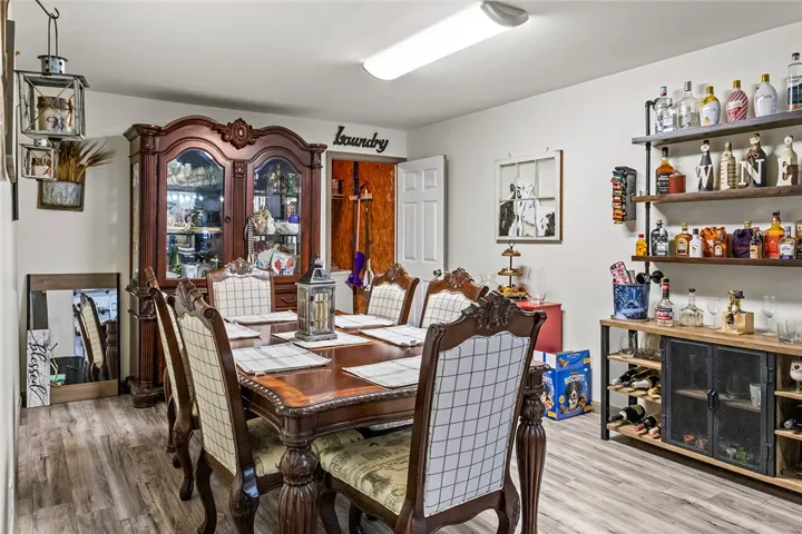 This versatile dining space features modern flooring and ample storage for entertaining and daily living.