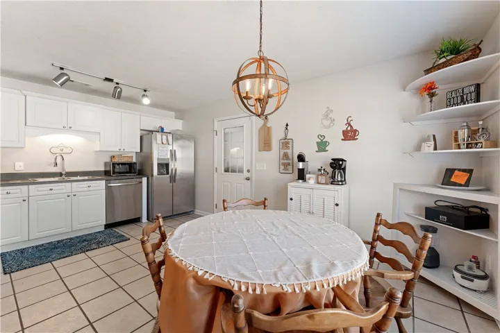 This bright kitchen offers a welcoming space for cooking and casual dining.