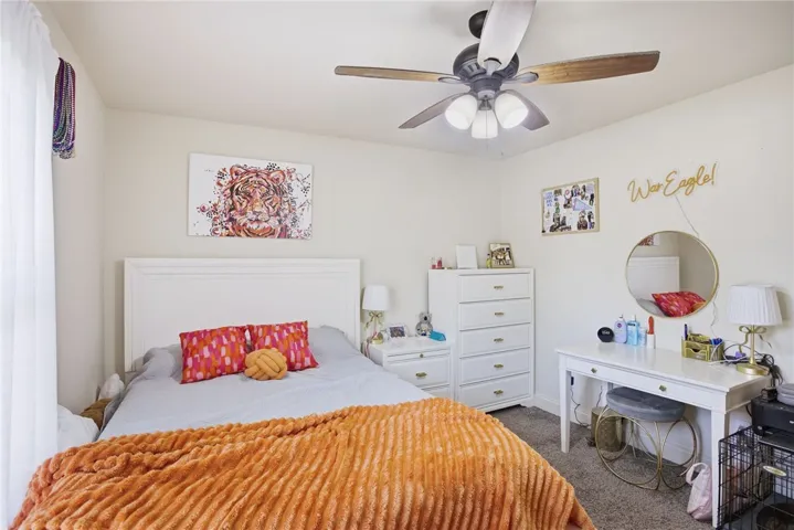 This cozy bedroom features a neutral palette, creating a tranquil retreat for relaxation.