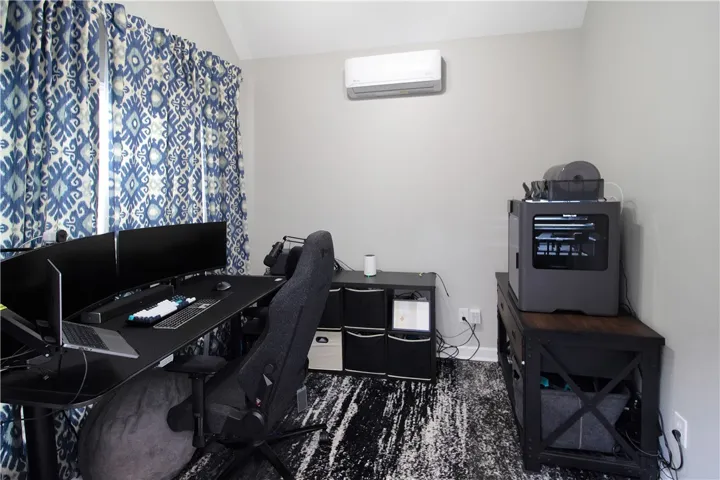 This versatile office space features ample natural light and a dedicated work area.