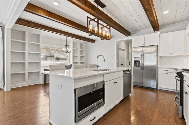 So many upgrades: beams, built-ins and shiplap ceiling