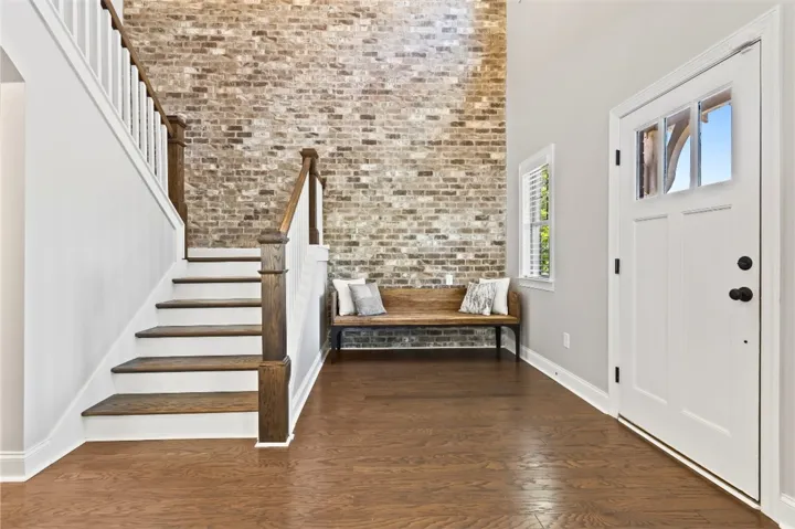 Stunning brick accent wall in foyer