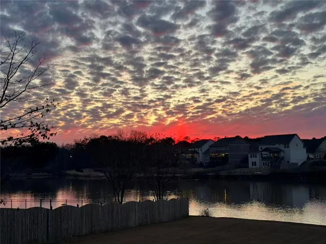 This serene waterfront setting provides peaceful living with captivating twilight views.