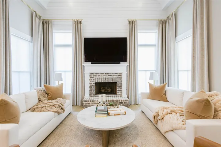 This bright living room offers a comforting ambiance, perfect for relaxing evenings.