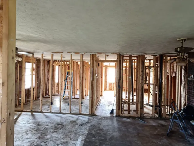 This interior view showcases a space undergoing extensive renovation, awaiting its transformation.