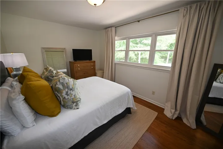 Bedroom 2, with hardwoods & lovely natural light!