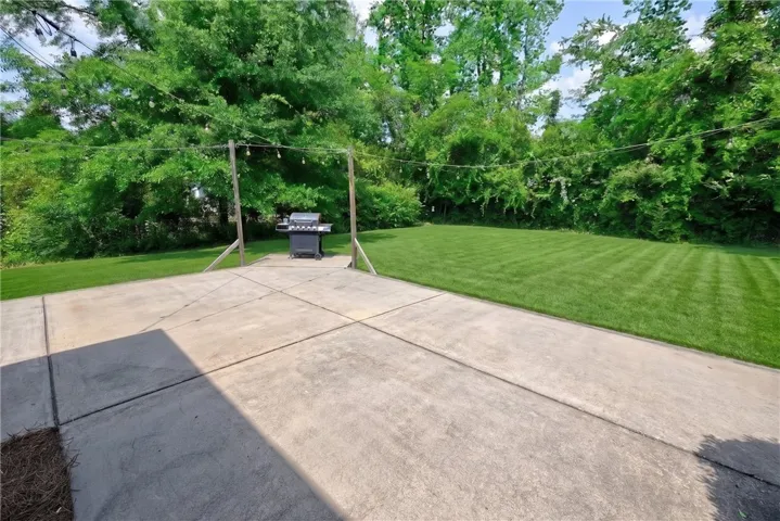 Level & super private back yard, with plenty of room for a pool!!