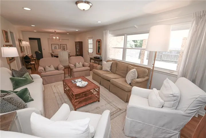 Formal living room with formal dining in background.