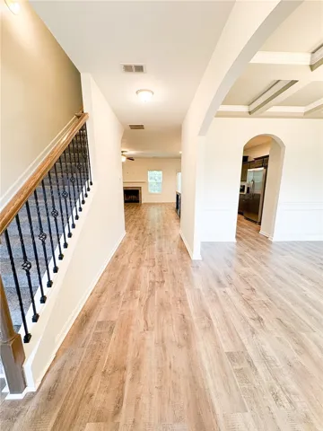 This inviting home boasts seamless transitions between living spaces, perfect for modern living.
