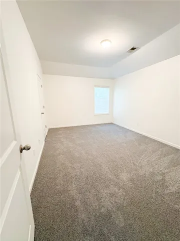 Bedroom 4 offers a comfortable and neutral canvas, ready for personalized touches.