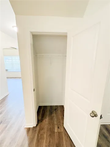 This interior closet offers essential storage, complementing the home's practical design.