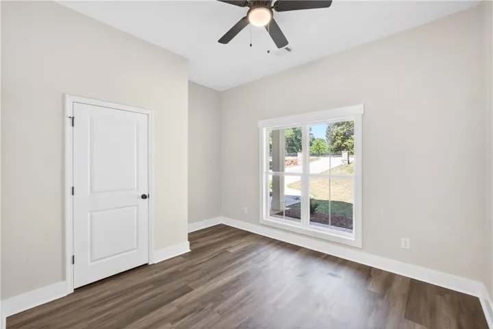 Bright and airy room with durable flooring and natural light.