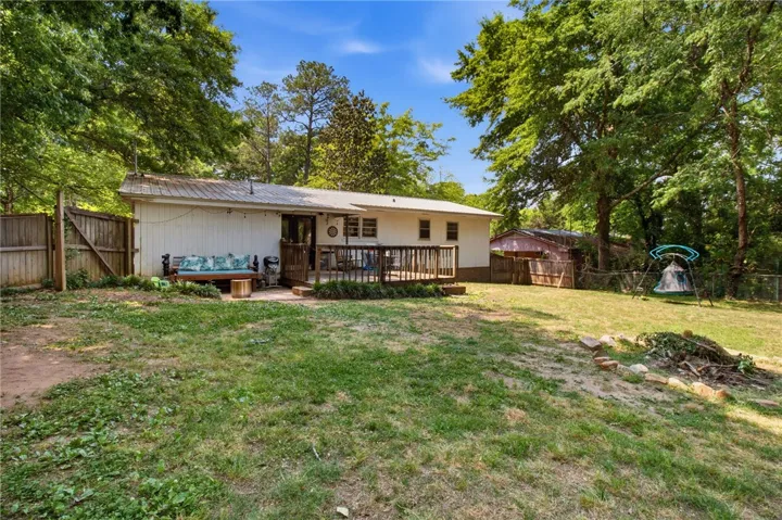 This residence offers a delightful outdoor deck for leisure and entertainment.
