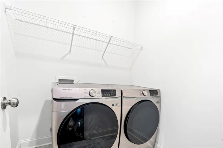 A well-appointed laundry area offers convenient, dedicated space for household chores.
