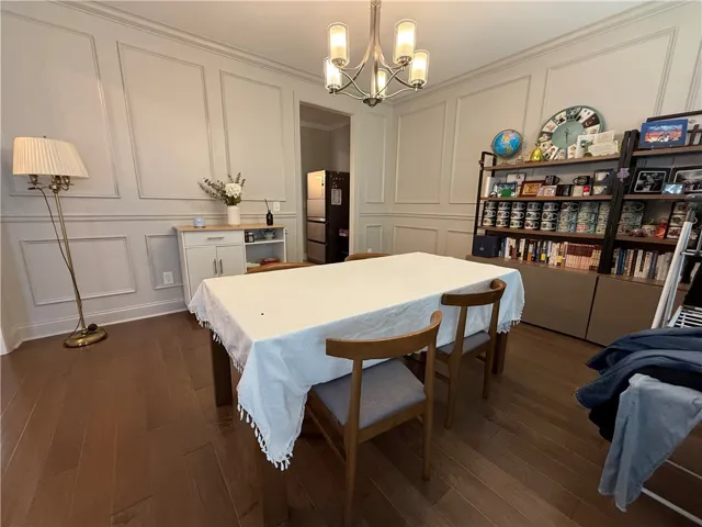 This inviting dining room offers a warm ambiance for gatherings.