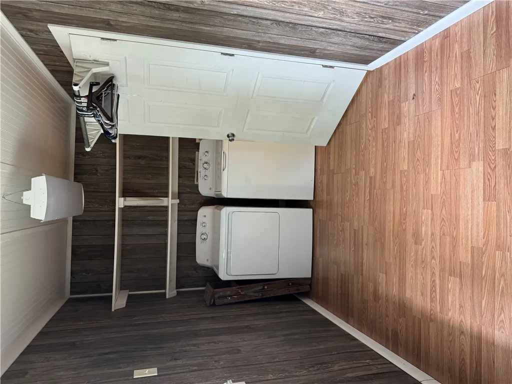Functional utility room with ample space for laundry appliances.