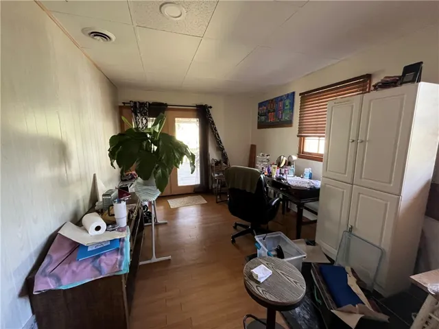 This versatile room offers ample space, perfect for an office or additional living area.