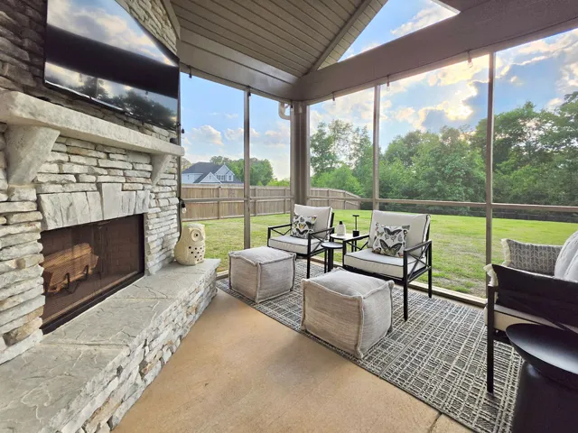 Relax on the Screened Porch with wood-burning fireplace!