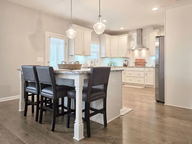 Large eat-at Island w/granite​​‌​​​​‌​​‌‌​‌‌​​​‌‌​‌​‌​‌​​​‌​​ countertop.
