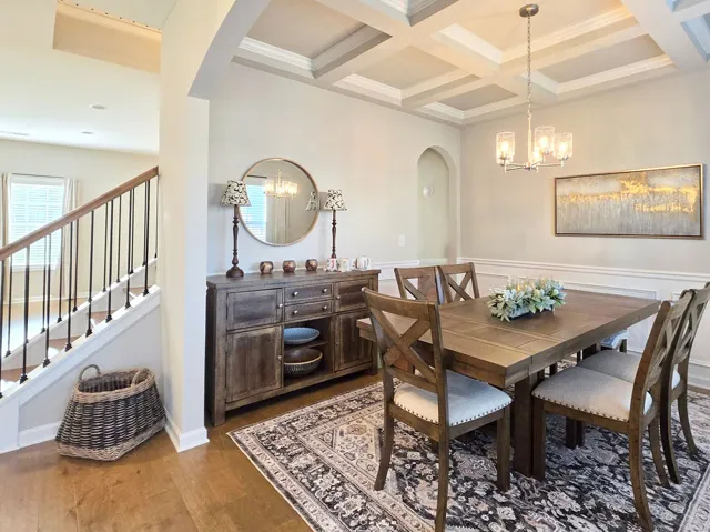 Dining Room features coffered ceiling and wainscoting!