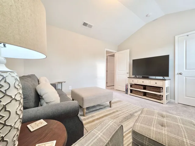 Bedroom 2 with vaulted ceiling