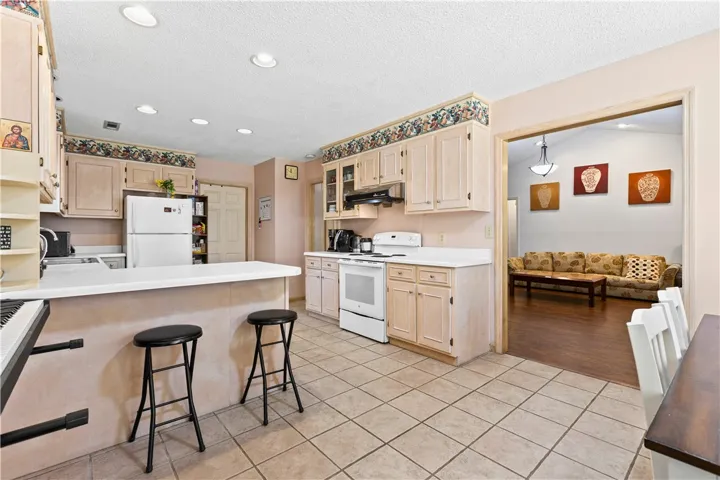 This functional kitchen features ample counter space and offers an open view to the adjacent living area.