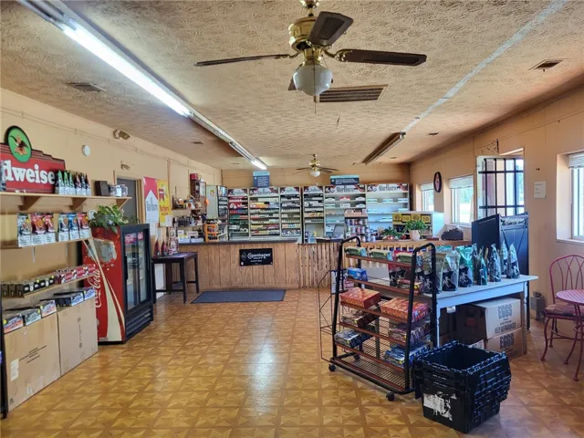 This versatile commercial space features ample display areas and convenient amenities for various business ventures.