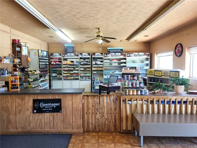 This versatile commercial space features a well-lit interior, perfect for various business ventures.