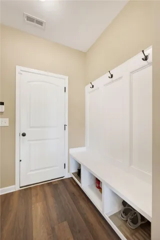 This mudroom offers practical built-in storage, perfect for organizing everyday essentials with ease.