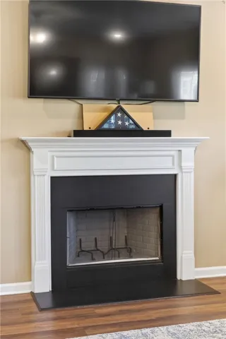 This inviting living space features a cozy fireplace, creating an atmosphere of warmth and comfort.