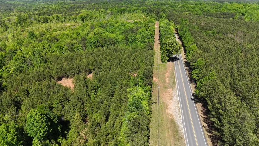 Expansive acreage offers a serene escape, perfect for a private estate or investment opportunity.