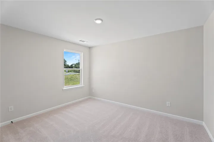 A well-lit room offers a clean canvas for your personal touches.